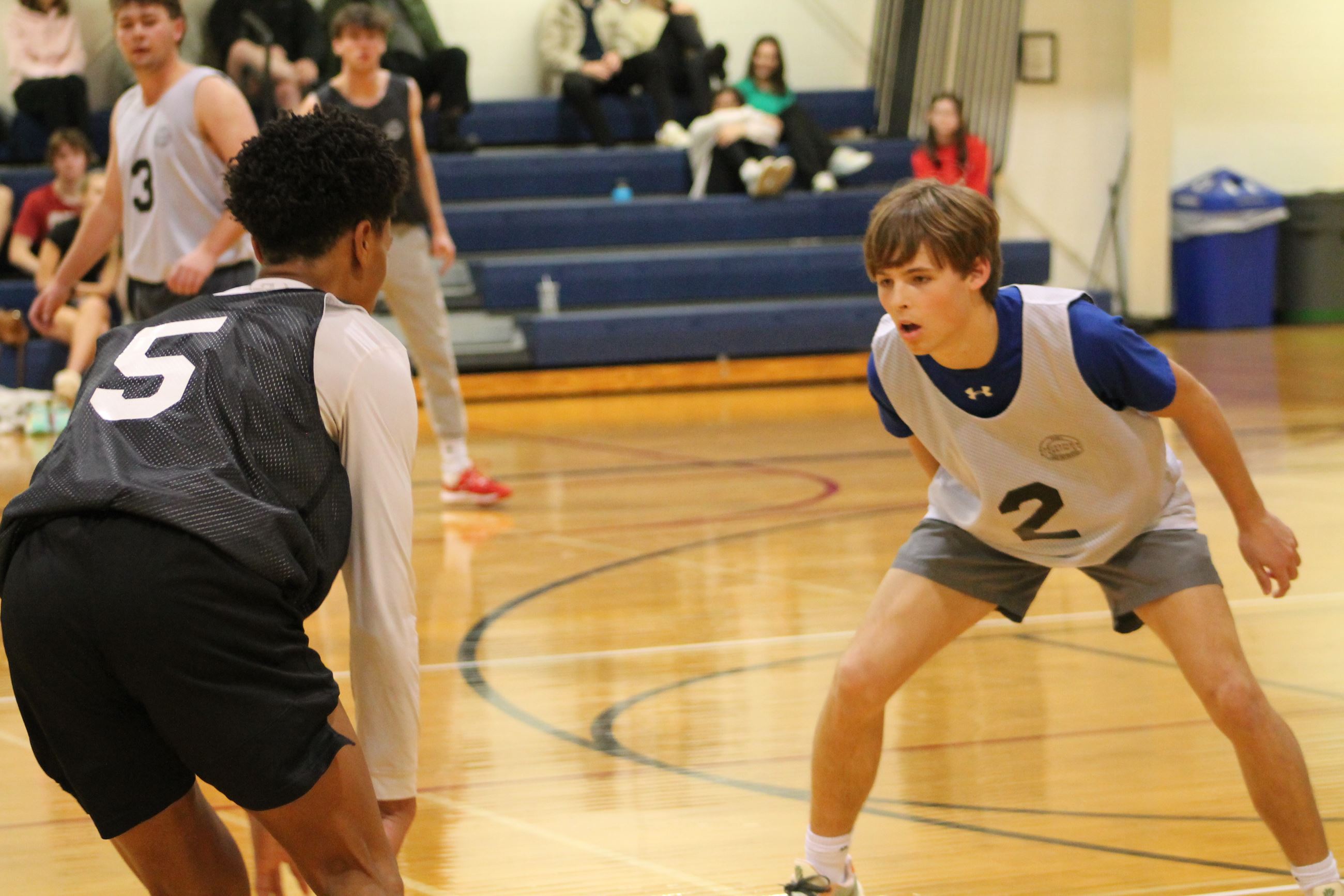 two basketball players on the court