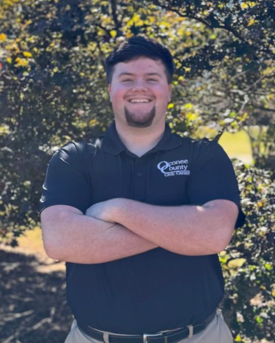 Headshot of smiling event assistant, Caden Fleming